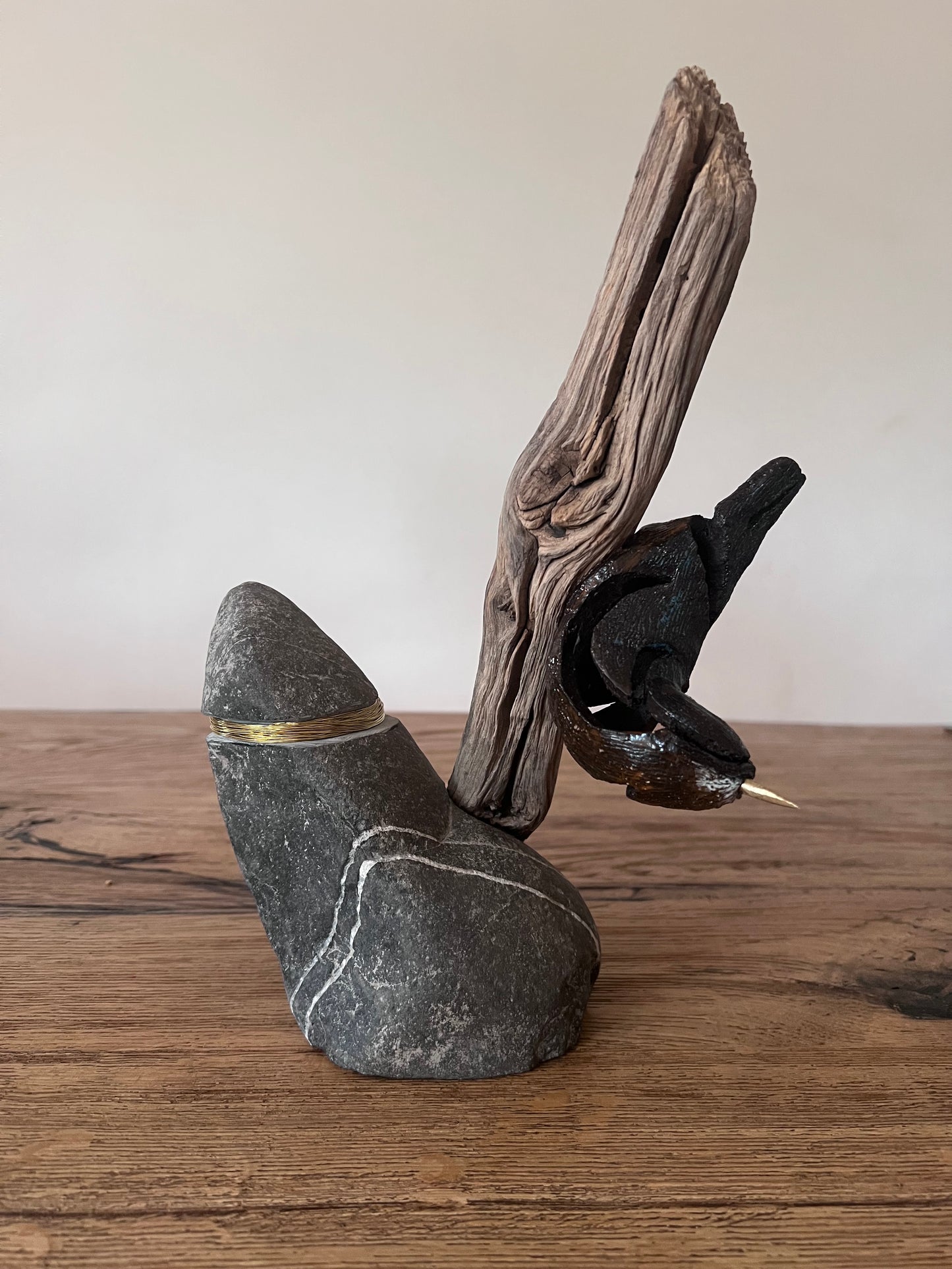 Boomklever op hout met steen en messing