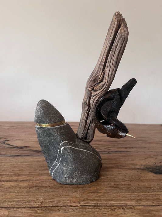 Boomklever op hout met steen en messing